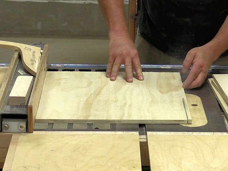 cutting the plywood panel to width